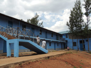 New school with the dormitory for the girls in the background.